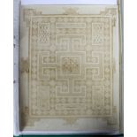 Seven sepia photographs of the 'Lindisfarne' Gospel,