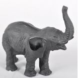 A Daum glass elephant, 20th century, etched marks, signed Leroy, in matt black and polished glass,