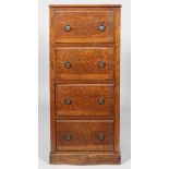 A Victorian dark-stained oak tall four drawer chest,