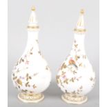 A pair of Royal Crown Derby bottle shaped vases and spire finials, late 19th century,