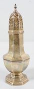 A silver octagonal baluster sugar caster, with pierced pull off top with an urn finial,