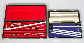 A cased set of drawing instruments, one ancillary set.