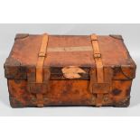A 19th century tan leather travelling trunk with two buckle straps and lift out tray,