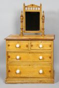 A painted pine chest of drawers, two small over two large drawers,