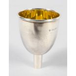 A small silver spirit funnel of tall bowl form, with gilt interior, by Asprey and Company,