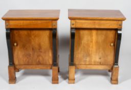 A pair of early C20th continental mahogany empire style bedside tables,