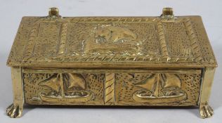 An Arts and Crafts brass box, decorated galleons,