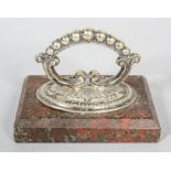 An Edwardian silver plated serpentine mounted paperweight,