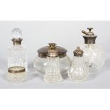 A group of silver and silver plated mounted cut glass scent bottles and other items,