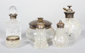 A group of silver and silver plated mounted cut glass scent bottles and other items,