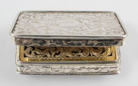 A silver vinaigrette, engraved with scrolling foliates with gilt interior,