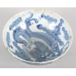 A Chinese blue and white dragon pattern bowl, 19th century, character mark,