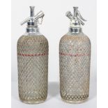 Two Art Deco chrome and glass mesh-covered soda syphons (Sparklets Ltd, London),