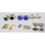 A collection of six pairs of cufflinks of variable designs.