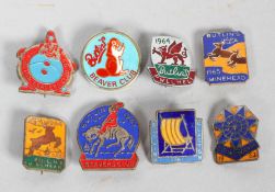 A collection of eight vintage Butlin's badges, each enamelled on a metal brooch,