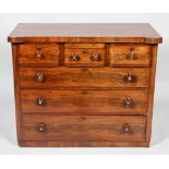 A Victorian mid 19th century chest of drawers with three short drawers above three long drawers,