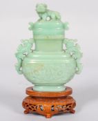 A Chinese carved jade censer, cover and hardwood stand,