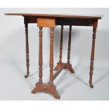 A Victorian mahogany Sutherland table with canted rectangular top above turned legs and stretcher,