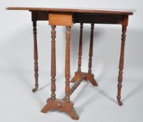 A Victorian mahogany Sutherland table with canted rectangular top above turned legs and stretcher,