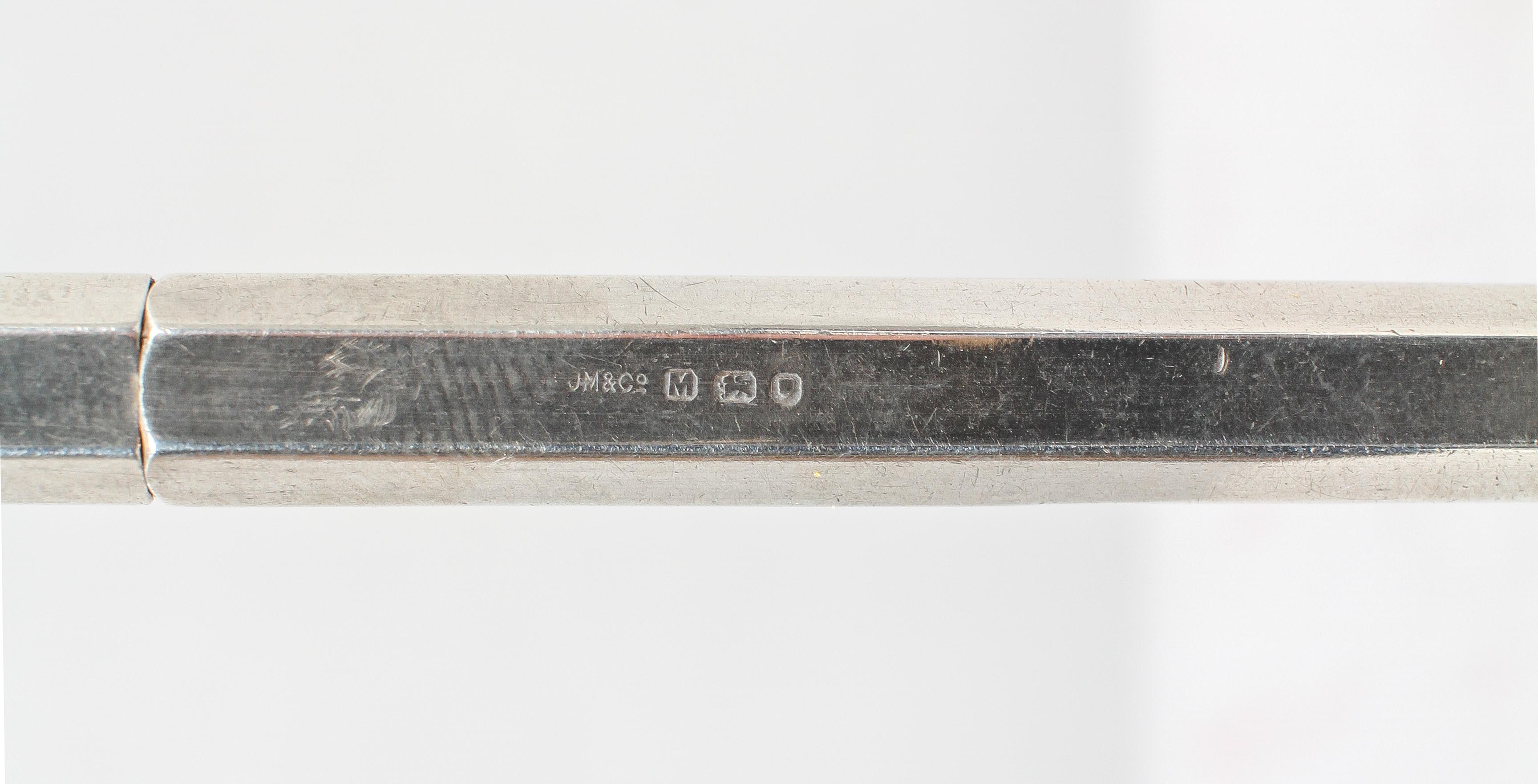 A silver propelling pencil, of plain panel hexagonal form with no clip, London 1947, - Image 2 of 2