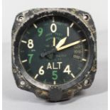 An Altimeter, designed for use in a bomber, the black dial labelled 'REF No 6A/15/2, Mk XB (P),