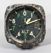 An Altimeter, designed for use in a bomber, the black dial labelled 'REF No 6A/15/2, Mk XB (P),