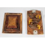 Two individual wooden carved block moulds, the first painted in yellow,