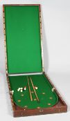 A Victorian mahogany folding Bagatelle table, mounted with green baize,