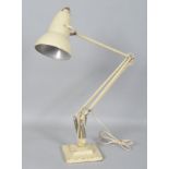 A Herbert and Sons Terry anglepoise lamp in cream enamel,