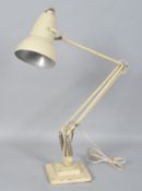 A Herbert and Sons Terry anglepoise lamp in cream enamel,