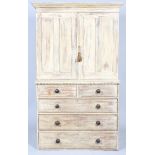 A Victorian painted pine kitchen dresser, the two panelled doors above a moulded plinth,