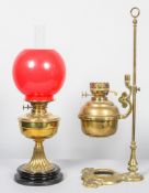 An Edwardian brass adjustable oil lamp on stand, early 20th century, stamped for Duplex,