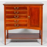 A mahogany music cabinet, 20th century, with five fall-front drawers and a panelled cupboard,