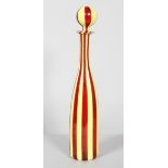 A Murano glass flask and stopper decorated in bands of yellow and red,