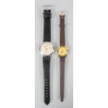 A collection of two Oris wristwatches. Mechanical movements. Both fitted with leather straps.