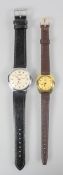 A collection of two Oris wristwatches. Mechanical movements. Both fitted with leather straps.