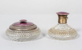 A silver mounted Art Deco cut glass and guilloche enamel perfume bottle and powder bowl with cover,
