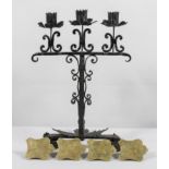 An Arts and Crafts wrought steel candelabra,