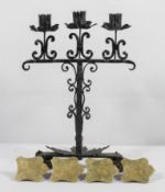 An Arts and Crafts wrought steel candelabra,