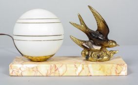 An Art Deco brass and marble mounted desk lamp, with opaque globe shade, gilt with lines,