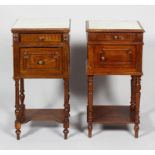 A matched pair of 19th century marble topped bedside cabinets,