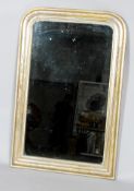 A late Victorian giltwood arched rectangular over mantel mirror,