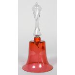 A cranberry tinted glass bell, 19th century,