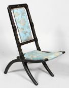 A Victorian ebonised small travelling folding child's chair,