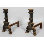 A pair of 19th century cast iron fire dogs,