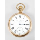 A gold plated open face pocket watch.