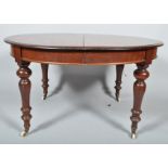 A Victorian mahogany extending dining table,