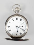 A full hunter pocket watch. Circular white dial; roman numerals. Swiss made manual wind movement.