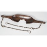 An antique Yoke, of traditional form, carved with turned knops and notch cut ends,