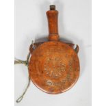 A treen, carved walnut powder flask and stopper, with tall tapering neck,